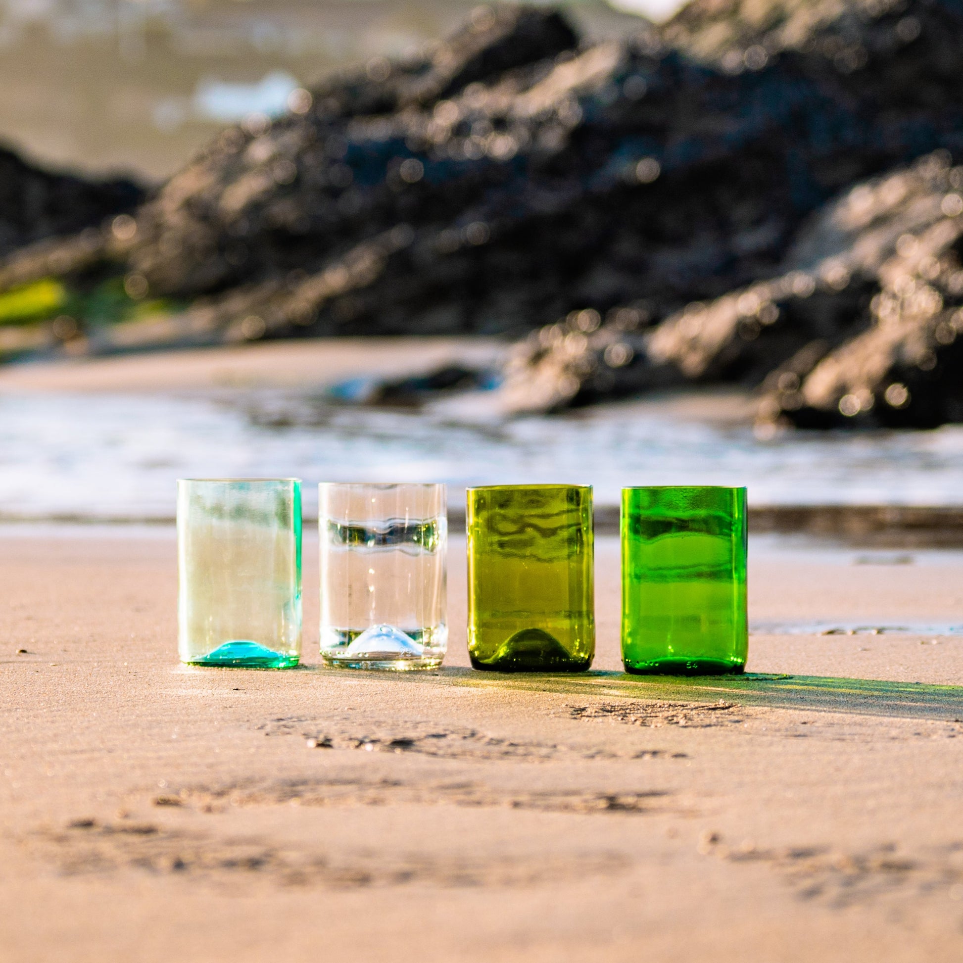 Multi coloured upcycled wine bottles