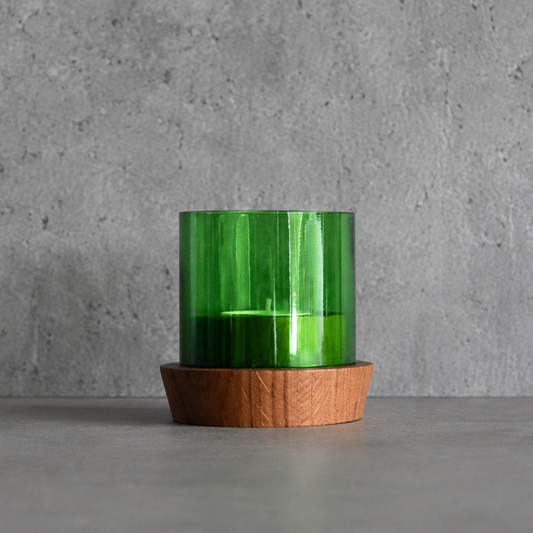 Upcycled green bottle tea light with wooden base 