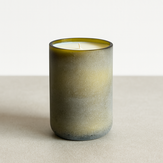 upcycled and refillable olive candle.
